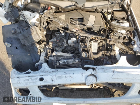2006 Mercedes-Benz CLK-Class 3.5L with VIN WDBTJ56J76F171100, listed as a Copart auction lot 77068234 with 86,635 mi miles and Salvage Title. Bid and sale history available at carsss.com. Image 11.