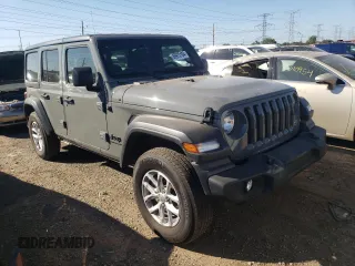 2023 Jeep Wrangler Sport with VIN 1C4HJXDN1PW701944, listed as a Copart auction lot 69973104 with 24,733 mi miles and Salvage Title. Bid and sale history available at DreamBid. Image 4.