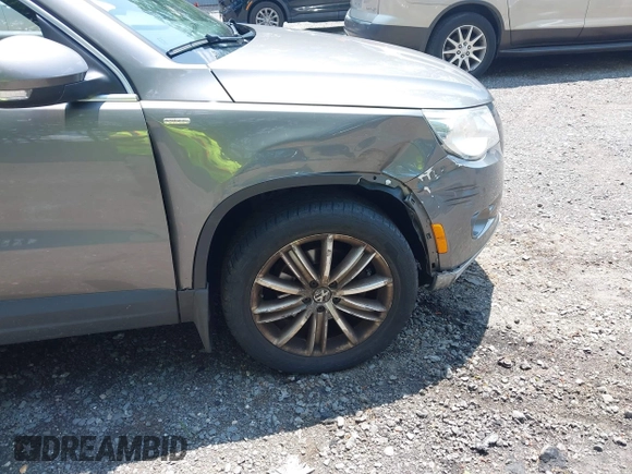 2010 Volkswagen Tiguan S with VIN WVGBV7AX1AW532415, listed as a IAAI auction lot 42561683 with 106,147 mi miles and . Bid and sale history available at DreamBid. Image 6.