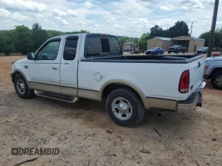 2000 Ford F-150 XL with VIN 1FTRX17L4YNB99870, listed as a Copart auction lot 60287985 with Not provided miles and Salvage title. Bid and sale history available at DreamBid. Image 2.