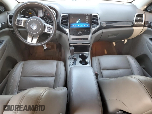 2011 Jeep Grand Cherokee Laredo with VIN 1J4RR4GGXBC642759, listed as a Copart auction lot 55767575 with 144,104 mi miles and Salvage title. Bid and sale history available at DreamBid. Image 8.