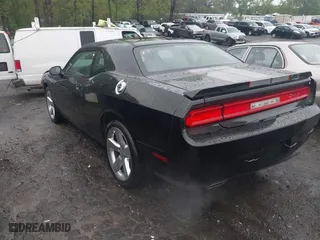 2011 Dodge Challenger with VIN 2B3CJ4DG2BH570266, listed as a IAAI auction lot 41943705 with 172,524 mi miles. Bid and sale history available at carsss.com. Image 3.