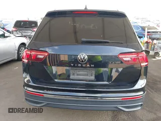 2023 Volkswagen Tiguan S with VIN 3VVRB7AX8PM068965, listed as a IAAI auction lot 42117545 with 60,121 mi miles and . Bid and sale history available at DreamBid. Image 16.