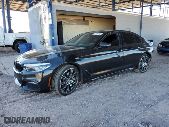 2018 BMW 5 Series 540i xDrive with VIN WBAJE7C5XJWD52054, listed as a Copart auction lot 47306535 with 49,185 mi miles and Salvage title. Bid and sale history available at DreamBid. Image 1.
