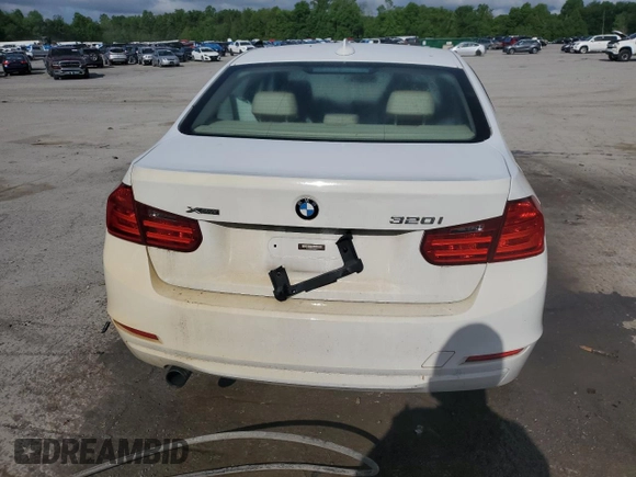 2013 BMW 3 Series 320i xDrive with VIN WBA3C3C57DF980971, listed as a Copart auction lot 57441155 with 131,263 mi miles and Salvage title. Bid and sale history available at DreamBid. Image 6.