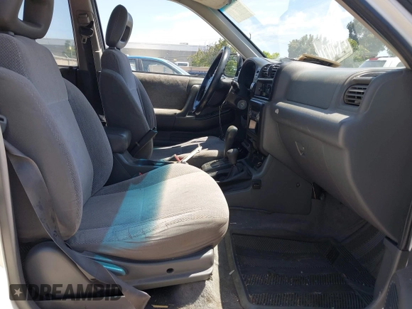 1999 Isuzu Rodeo S z VIN 4S2CM58WXX4347611, wystawiony jako IAAI lot #42351641 z przebiegiem 256 007 mil mil oraz . Historia ofert i sprzedaży dostępna na DreamBid. Obrazek 5.