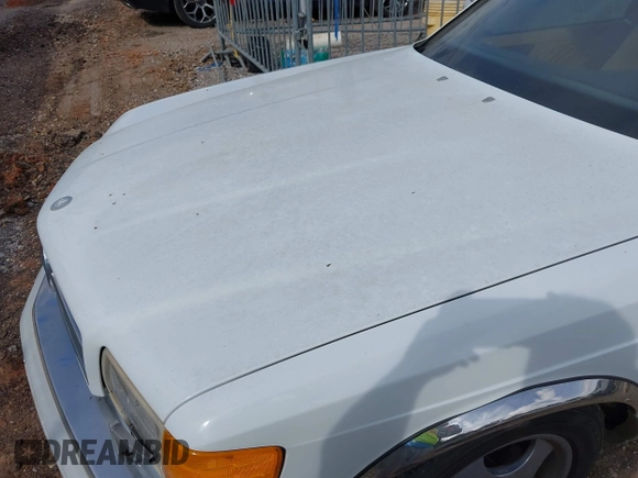 1990 Mercedes-Benz 560 with VIN WDBCA45E9LA549067, listed as a IAAI auction lot 41849642 with 124,516 mi miles and . Bid and sale history available at DreamBid. Image 6.