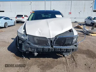 2016 Lincoln MKT EcoBoost z VIN 2LMHJ5AT0GBL00877, wystawiony jako IAAI lot #41722584 z przebiegiem 148 585 mil mil oraz . Historia ofert i sprzedaży dostępna na DreamBid. Obrazek 13.