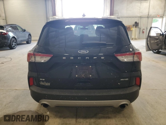 2021 Ford Escape SE with VIN 1FMCU9G69MUB23483, listed as a Copart auction lot 61095385 with 54,562 mi miles and Salvage title. Bid and sale history available at DreamBid. Image 6.