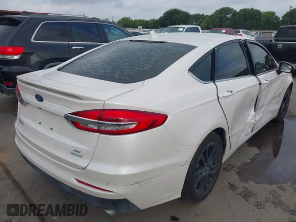2020 Ford Fusion SE with VIN 3FA6P0HD7LR148007, listed as a IAAI auction lot 42132944 with 63,328 mi miles and . Bid and sale history available at DreamBid. Image 4.