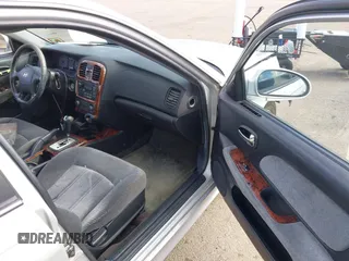 2003 Hyundai Sonata GLS with VIN KMHWF35H23A909117, listed as a IAAI auction lot 41535679 with 149,285 mi miles. Bid and sale history available at carsss.com. Image 5.
