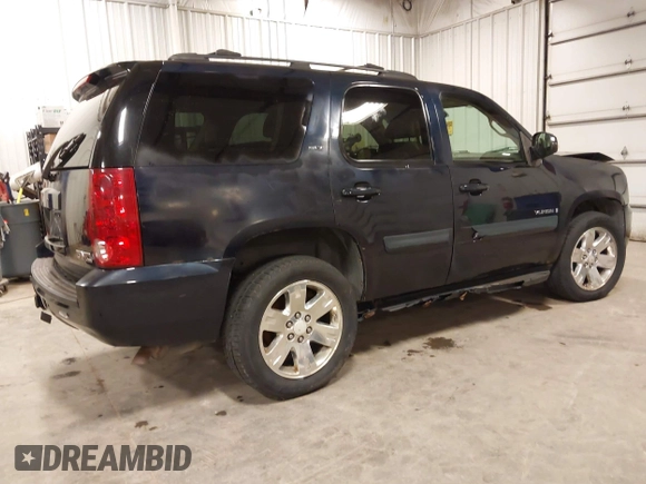 2007 GMC Yukon SLT z VIN 1GKFK130X7J115798, wystawiony jako IAAI lot #42039550 z przebiegiem 263 539 mil mil oraz . Historia ofert i sprzedaży dostępna na DreamBid. Obrazek 4.
