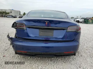 2023 Tesla Model S with VIN 5YJSA1E58PF498685, listed as a Copart auction lot 41690475 with Not provided miles and Salvage title. Bid and sale history available at DreamBid. Image 6.