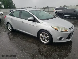 2014 Ford Focus SE with VIN 1FADP3F22EL103956, listed as a Copart auction lot 71005344 with 102,509 mi miles and Salvage Title. Bid and sale history available at carsss.com. Image 4.