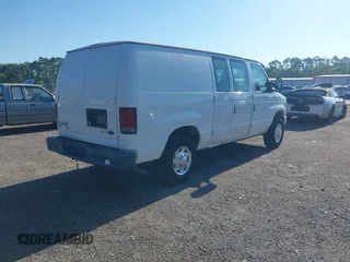 2011 Ford Econoline Cargo Commercial with VIN 1FTNE1EWXBDB18935, listed as a IAAI auction lot 42269977 with 240,545 mi miles and . Bid and sale history available at DreamBid. Image 4.