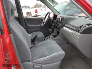 2004 Suzuki Grand Vitara with VIN JS3TE62V344100216, listed as a IAAI auction lot 41734638 with 213,166 mi miles. Bid and sale history available at carsss.com. Image 5.