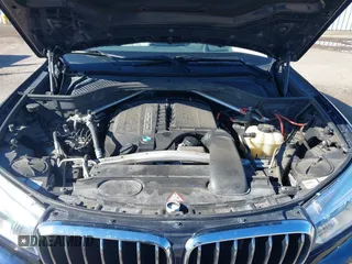2016 BMW X5 sDrive35i with VIN 5UXKR2C55G0R71330, listed as a IAAI auction lot 41661140 with 128,457 mi miles. Bid and sale history available at carsss.com. Image 10.