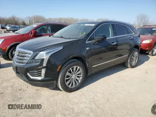2018 Cadillac XT5 Luxury AWD with VIN 1GYKNDRS0JZ242526, listed as a Copart auction lot 47269445 with 52,574 mi miles and Salvage Title. Bid and sale history available at DreamBid. Image 1.