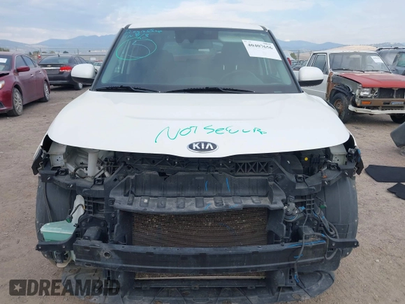 2020 Kia Soul LX with VIN KNDJ23AU0L7056999, listed as a IAAI auction lot 40407656 with 106,634 mi miles. Bid and sale history available at carsss.com. Image 13.
