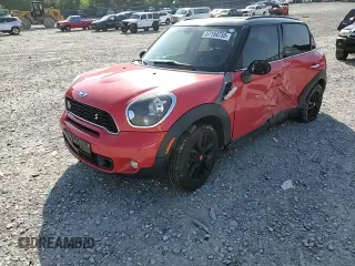 2012 MINI Countryman S with VIN WMWZC3C50CWL82827, listed as a Copart auction lot 57154755 with 149,751 mi miles and Salvage title. Bid and sale history available at DreamBid. Image 13.