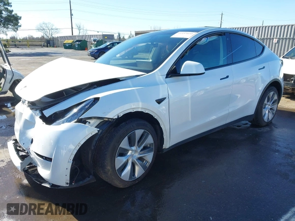 2022 Tesla Model Y Long Range with VIN 7SAYGDEE1NF402745, listed as a IAAI auction lot 41493850 with 11,222 mi miles and . Bid and sale history available at DreamBid. Image 19.