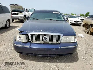 2004 Mercury Grand Marquis GS z VIN 2MEFM74W64X603871, wystawiony jako Copart lot #56545655 z przebiegiem 206 427 mil mil oraz Szkoda całkowita • Salvage title. Historia ofert i sprzedaży dostępna na DreamBid. Obrazek 5.