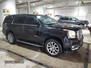 2015 GMC Yukon SLE with VIN 1GKS2AKC3FR664740, listed as a Copart auction lot 53824145 with 194,655 mi miles and Salvage Title. Bid and sale history available at carsss.com. Image 4.