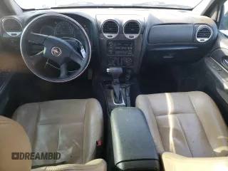 2007 GMC Envoy SLT with VIN 1GKDS13S972295861, listed as a Copart auction lot 74143314 with 167,332 mi miles and Salvage Title. Bid and sale history available at carsss.com. Image 8.
