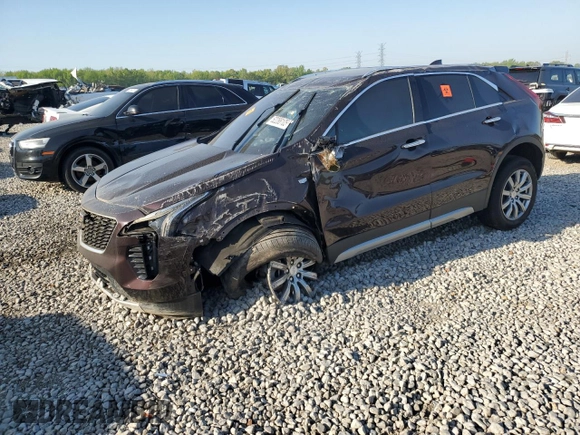 2021 Cadillac XT4 FWD Premium Luxury z VIN 1GYFZCR45MF002654, wystawiony jako Copart lot #52288105 z przebiegiem Nie podano mil oraz Szkody całkowita. Historia ofert i sprzedaży dostępna na DreamBid. Obrazek 1.