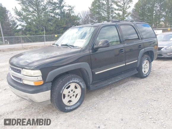 2004 Chevrolet Tahoe LT with VIN 1GNEC13Z74J314927, listed as a IAAI auction lot 41231288 with 195,809 mi miles and . Bid and sale history available at DreamBid. Image 2.