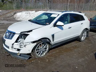 2014 Cadillac SRX Performance Collection with VIN 3GYFNFE30ES586713, listed as a IAAI auction lot 41791356 with 74,927 mi miles and . Bid and sale history available at DreamBid. Image 2.