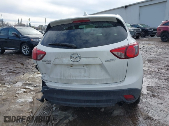 2014 Mazda CX-5 Grand Touring with VIN JM3KE4DY9E0300491, listed as a IAAI auction lot 41657153 with 157,394 mi miles and . Bid and sale history available at DreamBid. Image 16.