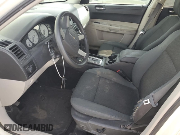 2005 Chrysler 300 with VIN 2C3JA43R25H616700, listed as a Copart auction lot 72081044 with 143,129 mi miles and Salvage Title. Bid and sale history available at carsss.com. Image 7.