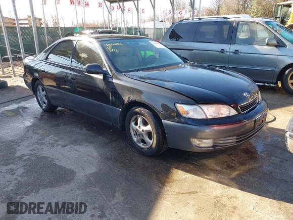 1997 Lexus ES 300 Luxury Sport Sdn with VIN JT8BF22GXV5003056, listed as a IAAI auction lot 41806886 with 130,063 mi miles. Bid and sale history available at carsss.com. Image 1.