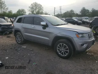2014 Jeep Grand Cherokee Limited with VIN 1C4RJFBG8EC496303, listed as a Copart auction lot 56215195 with 129,269 mi miles and Salvage Title. Bid and sale history available at DreamBid. Image 4.