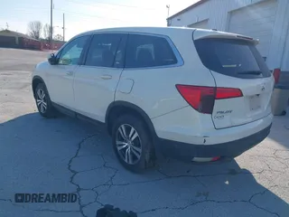 2016 Honda Pilot EX-L with VIN 5FNYF5H5XGB016152, listed as a IAAI auction lot 41820023 with 210,474 mi miles and . Bid and sale history available at DreamBid. Image 3.