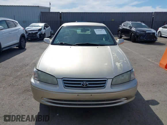 2000 Toyota Camry LE z VIN JT2BF22K5Y0258522, wystawiony jako IAAI lot #41998874 z przebiegiem 300 186 mil mil oraz . Historia ofert i sprzedaży dostępna na DreamBid. Obrazek 12.