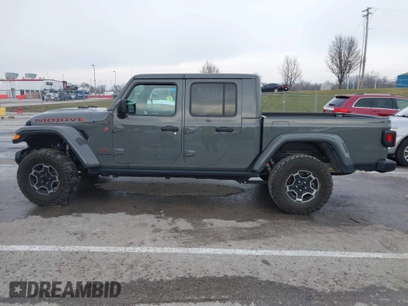 2022 Jeep Gladiator Mojave z VIN 1C6JJTEG8NL130971, wystawiony jako IAAI lot #41163074 z przebiegiem 47 142 mil mil oraz . Historia ofert i sprzedaży dostępna na DreamBid. Obrazek 15.