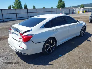 2020 Honda Accord Sport with VIN 1HGCV1F31LA003706, listed as a IAAI auction lot 42626232 with 67,758 mi miles and . Bid and sale history available at DreamBid. Image 4.