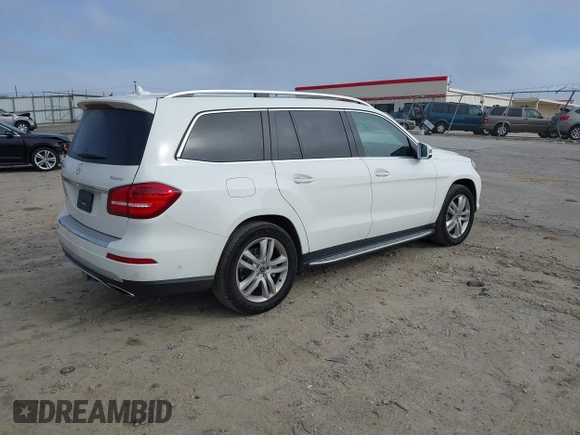 2018 Mercedes-Benz GLS with VIN 4JGDF6EE9JB077331, listed as a IAAI auction lot 41795143 with 99,148 mi miles. Bid and sale history available at carsss.com. Image 4.