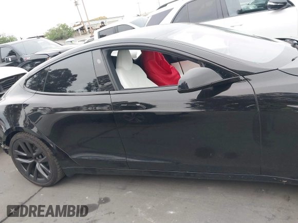 2022 Tesla Model S with VIN 5YJSA1E55NF474342, listed as a IAAI auction lot 41870994 with 33,804 mi miles and . Bid and sale history available at DreamBid. Image 14.