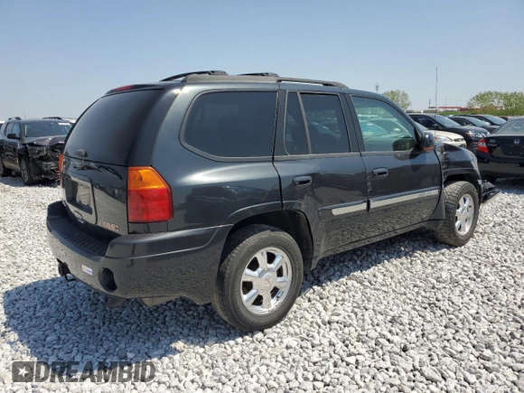 2004 GMC Envoy SLT with VIN 1GKDT13S842421586, listed as a Copart auction lot 51936515 with 188,977 mi miles and Salvage title. Bid and sale history available at DreamBid. Image 3.