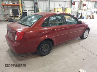 2007 Suzuki Forenza z VIN KL5JD56Z47K599789, wystawiony jako IAAI lot #41747725 z przebiegiem 145 029 mil mil oraz . Historia ofert i sprzedaży dostępna na DreamBid. Obrazek 4.