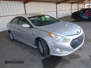 2015 Hyundai Sonata Hybrid Limited with VIN KMHEC4A49FA133103, listed as a IAAI auction lot 41885524 with 122,261 mi miles. Bid and sale history available at carsss.com. Image 1.