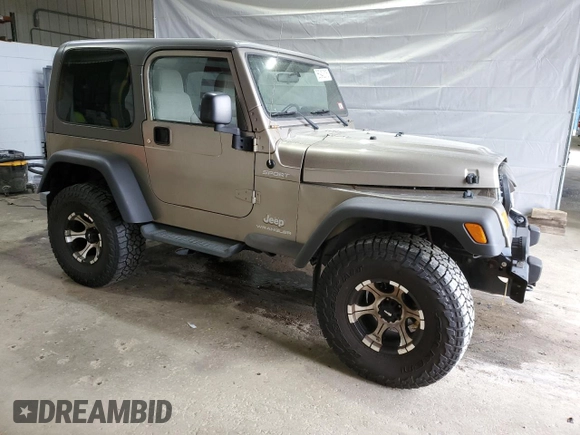 2005 Jeep Wrangler Sport z VIN 1J4FA49S75P325028, wystawiony jako Copart lot #56942315 z przebiegiem 169 988 mil mil oraz Szkoda całkowita • Salvage title. Historia ofert i sprzedaży dostępna na DreamBid. Obrazek 4.