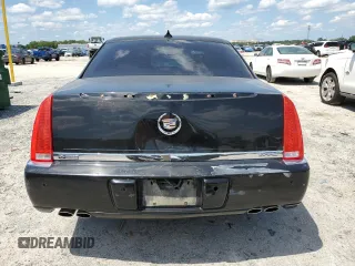 2010 Cadillac DTS 1SD z VIN 1G6KH5EY5AU110844, wystawiony jako Copart lot #57141785 z przebiegiem 173 657 mil mil oraz Tytuł czysty. Historia ofert i sprzedaży dostępna na DreamBid. Obrazek 6.
