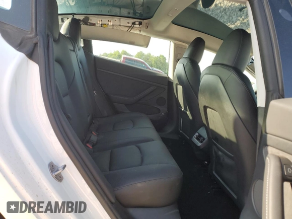2023 Tesla Model 3 with VIN 5YJ3E1EA4PF631304, listed as a Copart auction lot 52500695 with 33,024 mi miles and Salvage title. Bid and sale history available at DreamBid. Image 10.