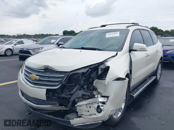 2015 Chevrolet Traverse LT z VIN 1GNKRGKD4FJ137234, wystawiony jako IAAI lot #42655806 z przebiegiem 60 871 mil mil oraz . Historia ofert i sprzedaży dostępna na DreamBid. Obrazek 6.
