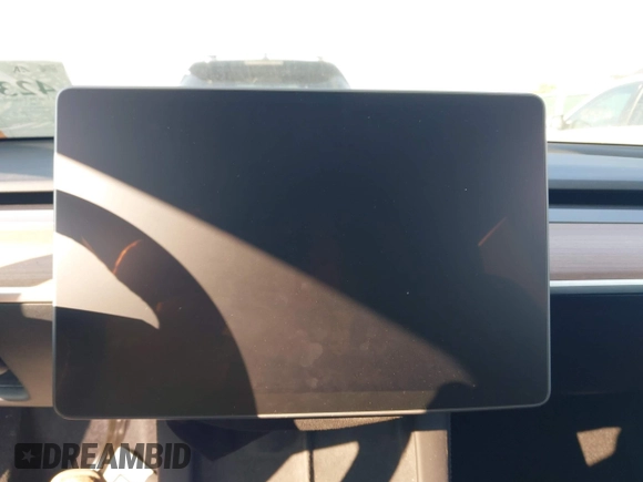 2023 Tesla Model Y Long Range with VIN 7SAYGDEE0PF671726, listed as a IAAI auction lot 42393616 with Not provided miles and . Bid and sale history available at DreamBid. Image 17.