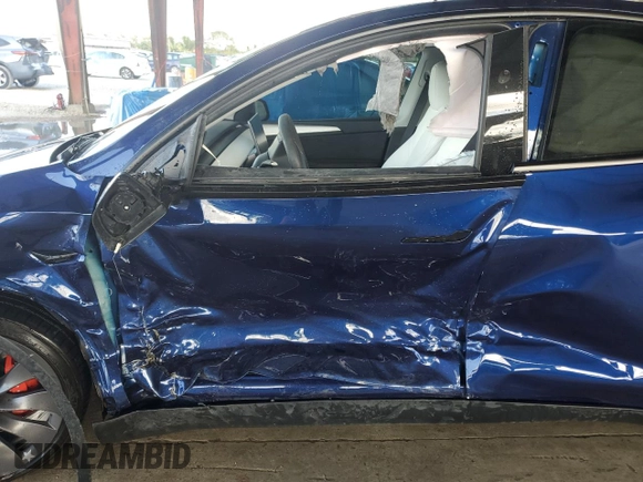 2023 Tesla Model Y Performance with VIN 7SAYGDEF1PF865688, listed as a Copart auction lot 44924385 with 19,255 mi miles and Non Repairable. Bid and sale history available at DreamBid. Image 7.
